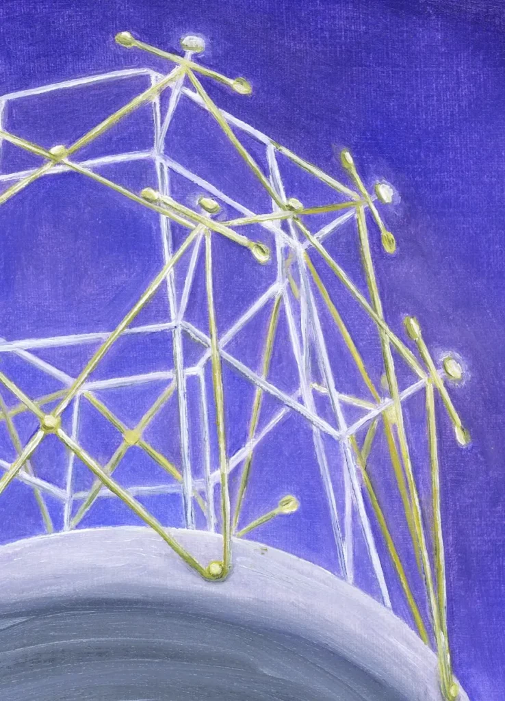 Metal structure on a concrete platform seen from below, shining in the night